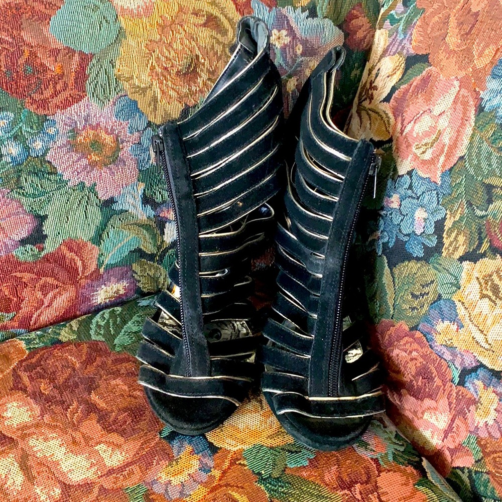 Dolce vita black with gold trim cage sandals worn only once size 7 1/2.